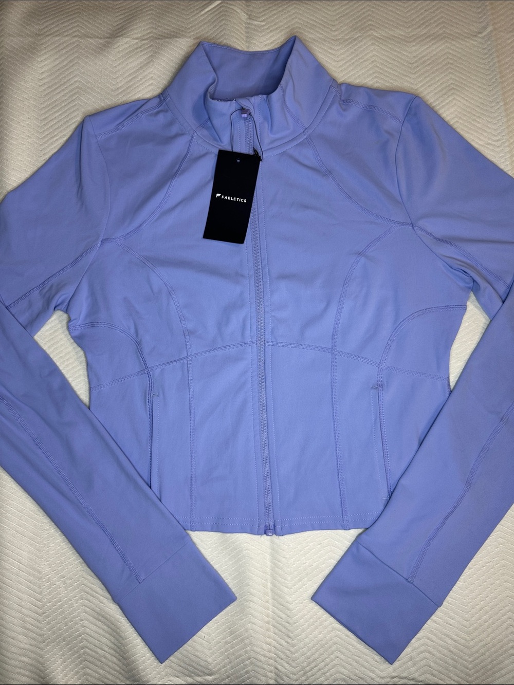 Fabletics Perfect Storm Cropped Train Jacket in Peri Paradise- L